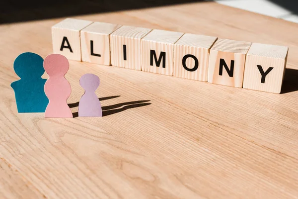 Wooden Blocks Alimony Lettering Family Paper People Textured Surface — Stock Photo, Image