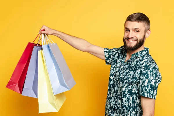 Side View Happy Bearded Guy Holding Shopping Bags Yellow — Stock Photo, Image