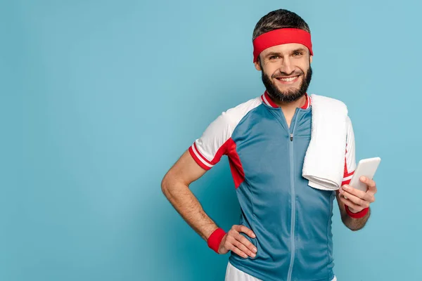 Smiling Stylish Sportsman Towel Using Smartphone Blue Background — Stock Photo, Image