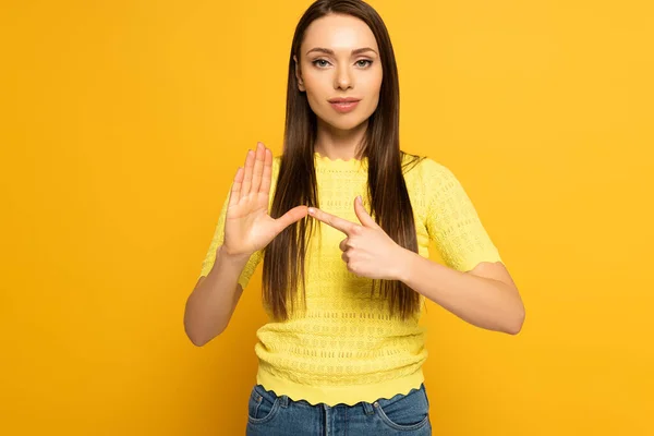 Young Woman Using Deaf Dumb Language Yellow Background — Stok fotoğraf