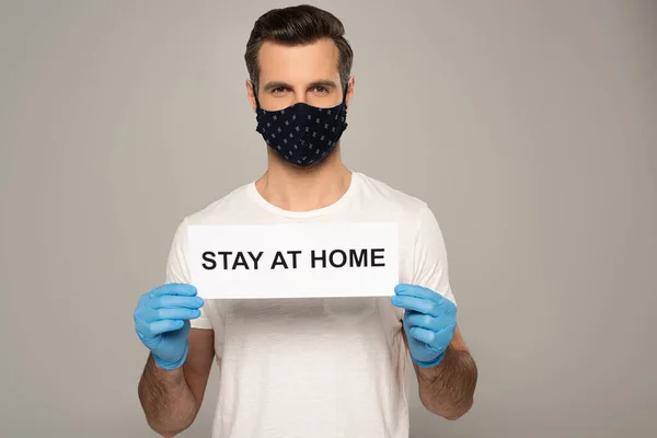 Man Safety Mask Latex Gloves Holding Card Stay Home Lettering — Φωτογραφία Αρχείου