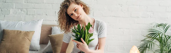 Panoramic Shot Curly Girl Holding Tulips Bedroom Himalayan Salt Lamp — Stock Photo, Image