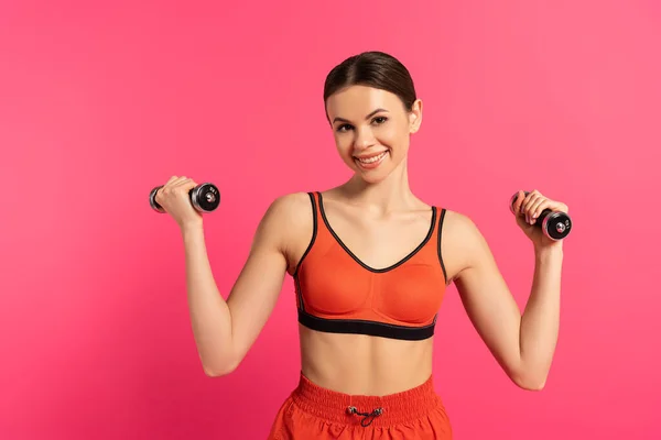 Young Happy Sportswoman Exercising Dumbbells Isolated Pink — Stock Photo, Image