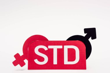 gender symbols near paper with std lettering on white clipart