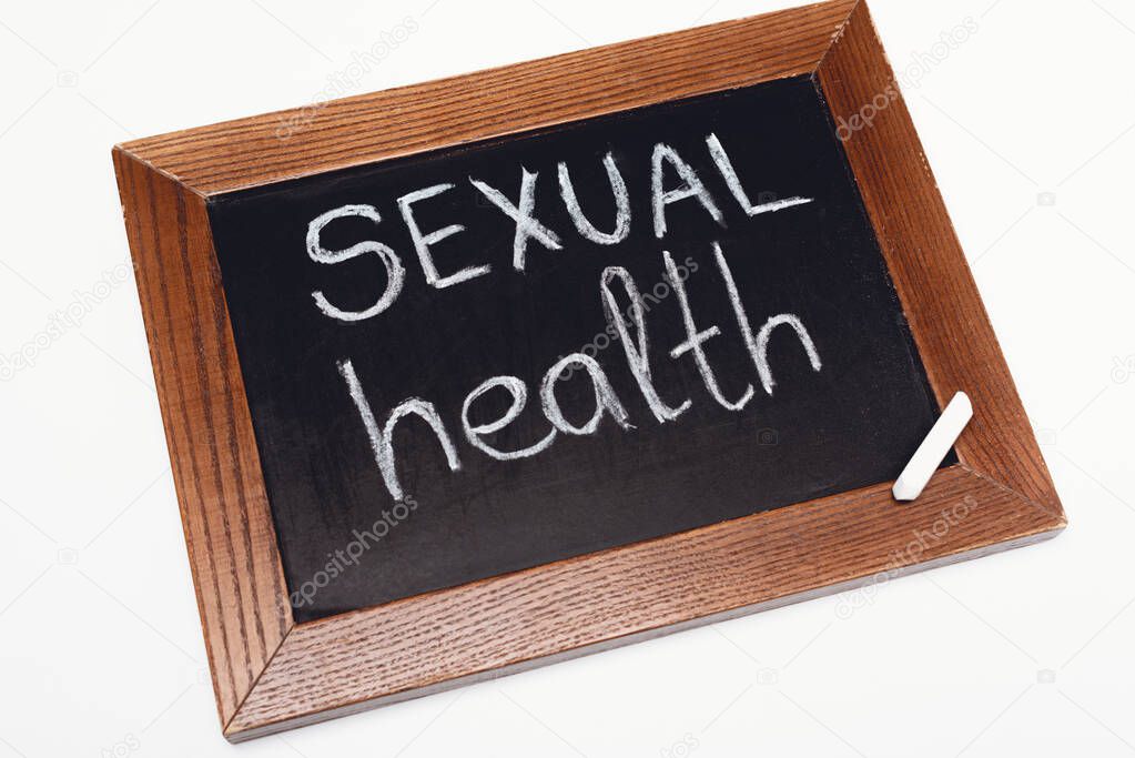 chalkboard with sexual health lettering isolated on white 