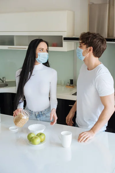 Young Couple Medical Masks Having Breakfast Home Self Isolation — Stock Photo, Image