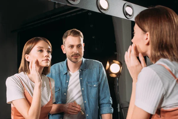 Selective Focus Beautiful Model Touching Face While Looking Mirror Handsome — Stock Photo, Image