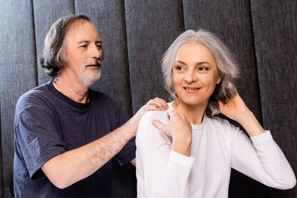 Bearded Mature Man Doing Massage Happy Wife Home — Stock Photo, Image