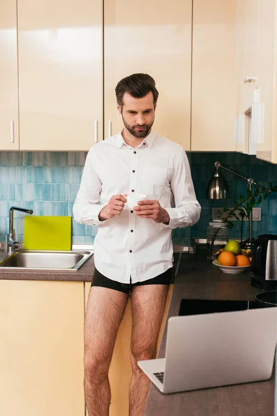 Selective Focus Handsome Man Panties Shirt Looking Laptop While Drinking — Stock Photo, Image