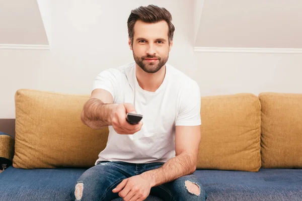 Handsome Man Using Remote Controller While Clicking Channels Couch — Stock Photo, Image