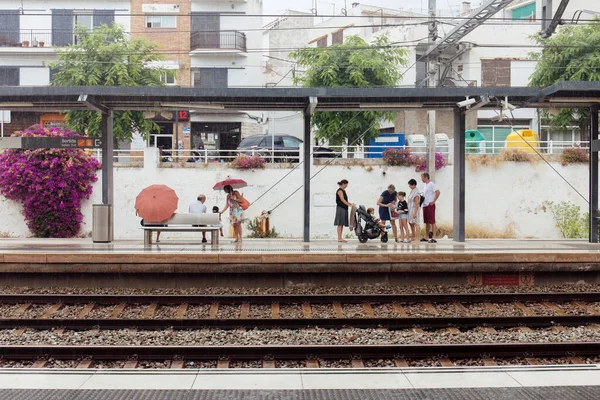 Catalonia Spain April 2020 People Umbrellas Waiting Train Station — Stock Photo, Image