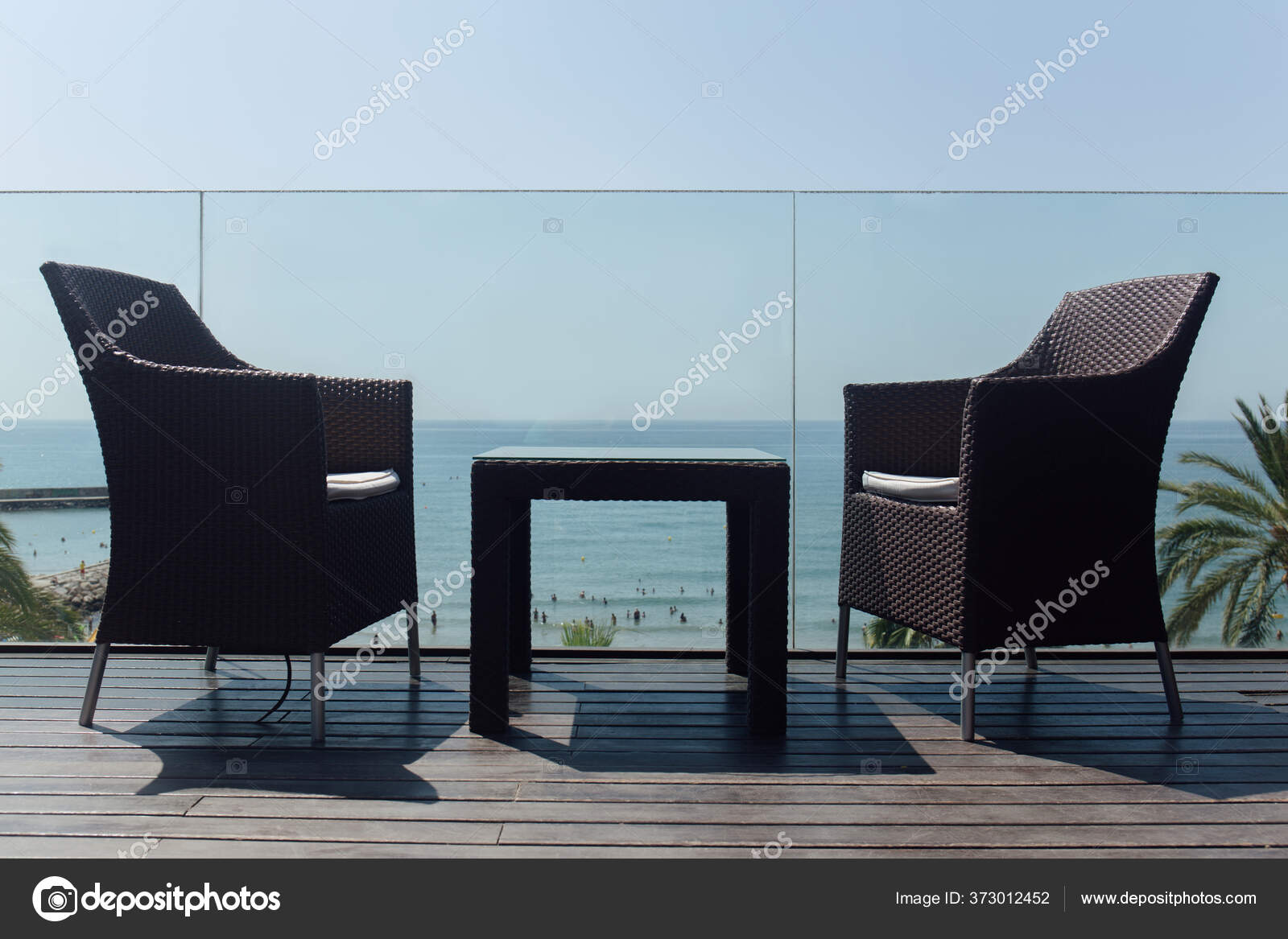 Low Angle View Table Chairs Glass Fencing Seascape Background Catalonia