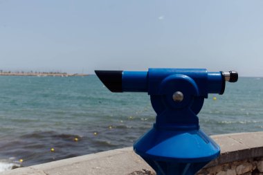 Selective focus of blue scenic viewer with sea and blue sky at background in Catalonia, Spain  clipart