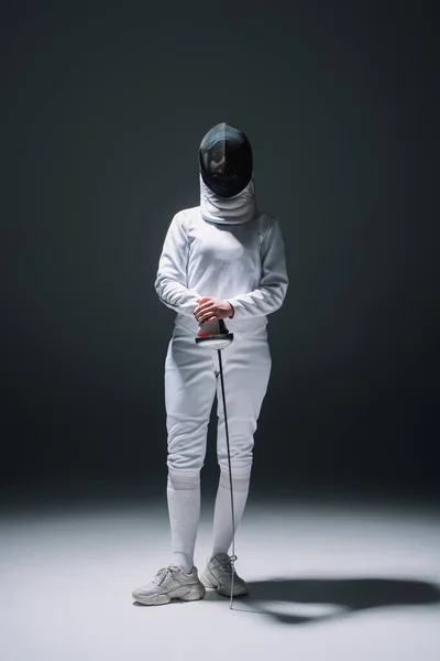 Fencer Fencing Mask Suit Holding Rapier Spotlight Black Background — Stock Photo, Image