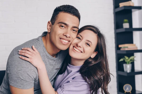 Cheerful Woman Hugging Handsome Racial Man Bedroom — Stock Photo, Image