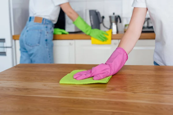 Cropped View Sisters Rubber Gloves Cleaning Kitchen — Stock Photo, Image
