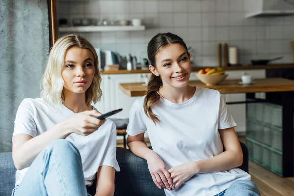 Attractive Young Sisters Watching Movie Home — Stock Photo, Image