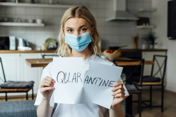 Woman Medical Mask Tearing Card Quarantine Lettering Home — Stock Photo, Image