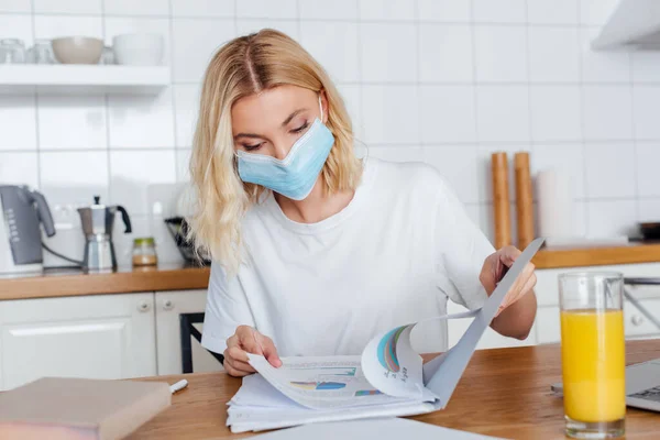 Selective Focus Blonde Woman Medical Mask Working Documents Laptop Book — Stock Photo, Image