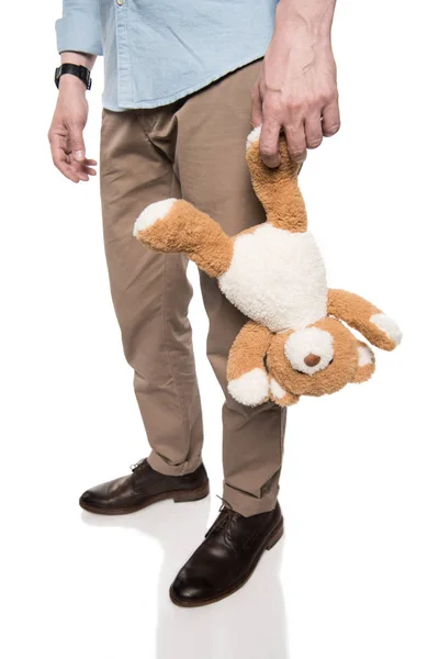 Casual man holding teddy bear — Stock Photo