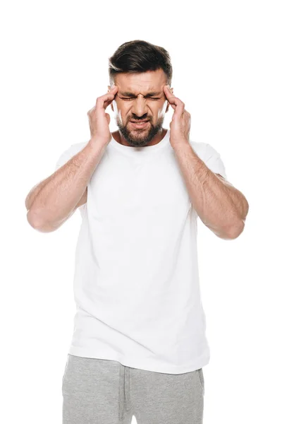 Человек с огромной головной болью — стоковое фото