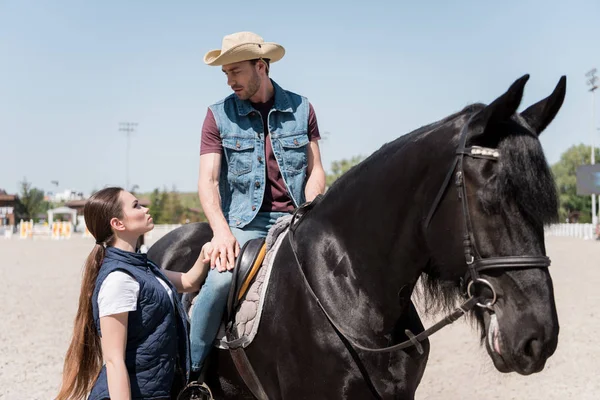 Couple riding horse — Stock Photo