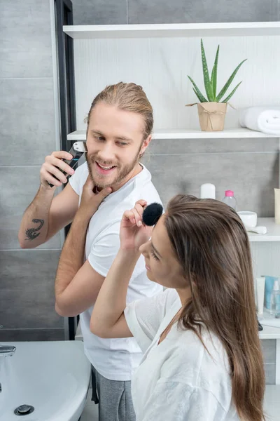 Young couple in bathroom in the morning  4 — Stock Photo