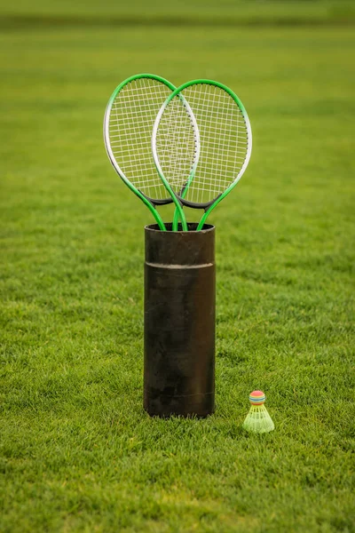 Badminton racquets in container — Stock Photo