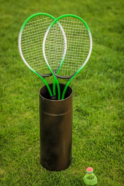 Badminton racquets in container — Stock Photo
