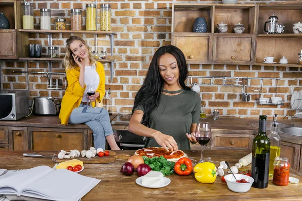 Multiethnic women in kitchen — Stock Photo