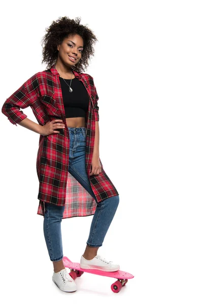 African american woman with skateboard — Stock Photo