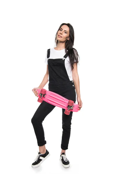 Young woman with skateboard — Stock Photo