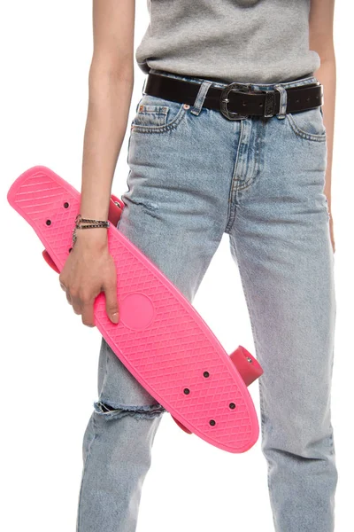 Young woman with skateboard — Stock Photo