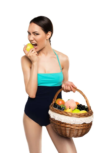 Mujer en traje de baño con frutas - foto de stock