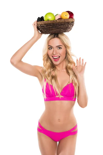 Mujer en traje de baño con frutas - foto de stock