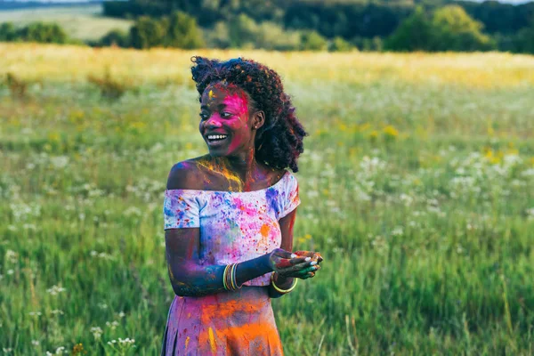 African american woman on holi festival — Stock Photo