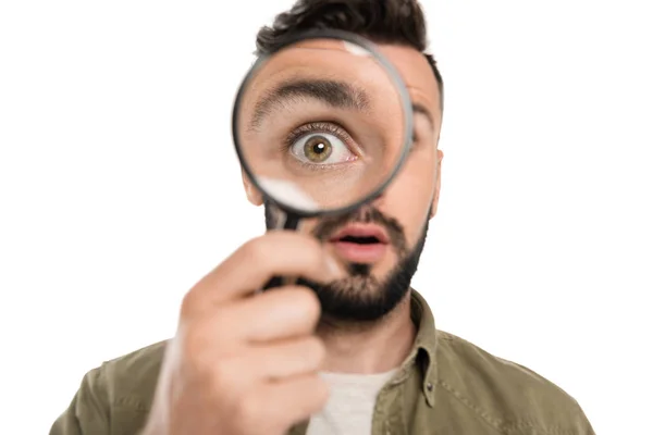 Man holding magnifying glass — Stock Photo