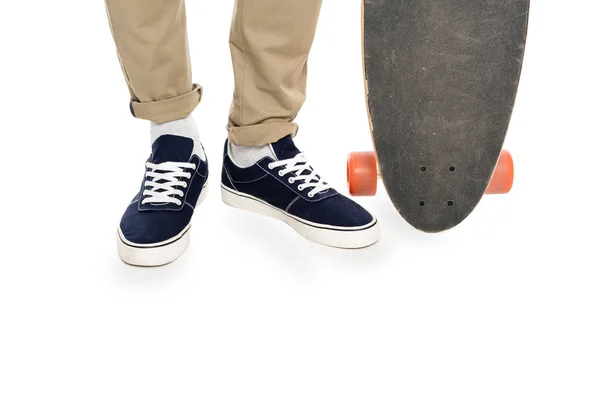 Male legs and longboard — Stock Photo