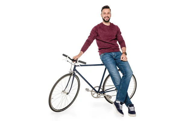 Hombre apoyado en la bicicleta - foto de stock