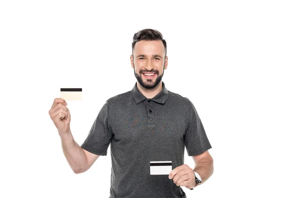 Hombre mostrando tarjetas de crédito - foto de stock