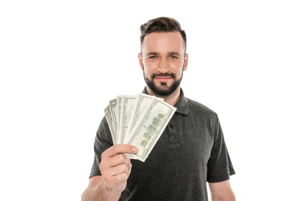 Homem segurando notas de dólar — Fotografia de Stock