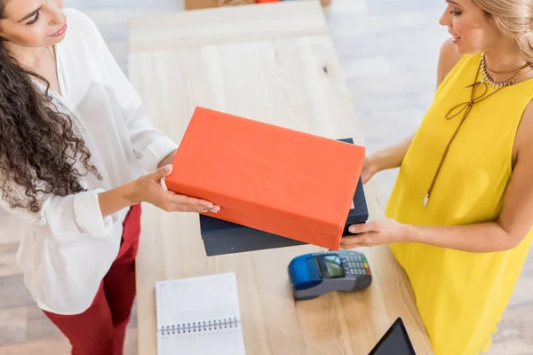 Woman buying shoes — Stock Photo