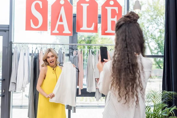 Women in clothes store — Stock Photo