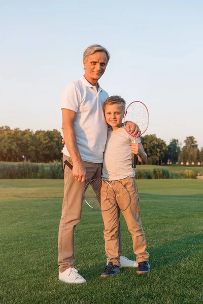 Grandfather and grandson in park — Stock Photo