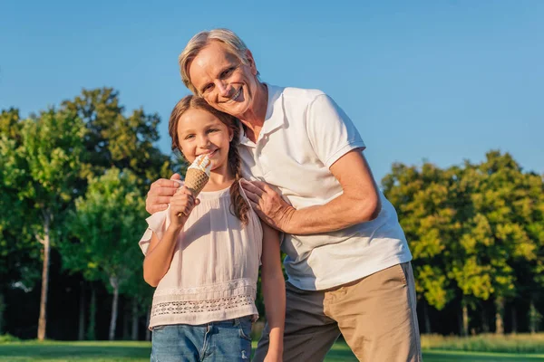 Kid eating ice cream — Stock Photo