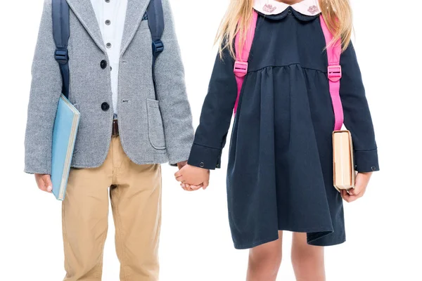 Pupils holding hands — Stock Photo