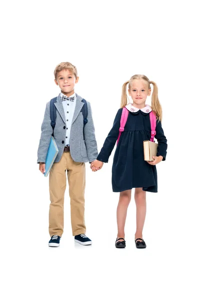 Pupils holding hands — Stock Photo