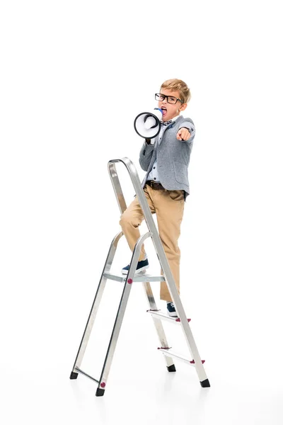 Schoolboy on stepledder with loudspeaker — Stock Photo