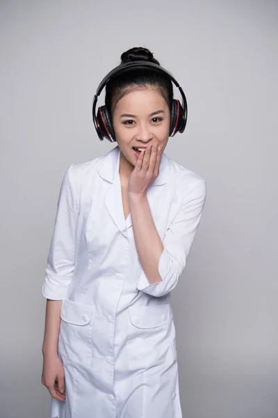 Laughing woman in headphones — Stock Photo