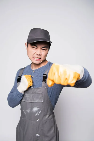 Construction worker lunging forward — Stock Photo